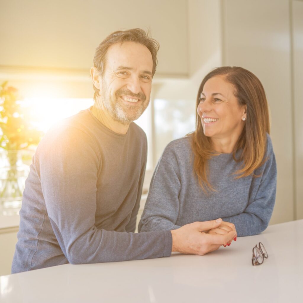 Can you afford to retire — or slow down — without worrying you’ll run out? 1 Happy Couple In Their 50s