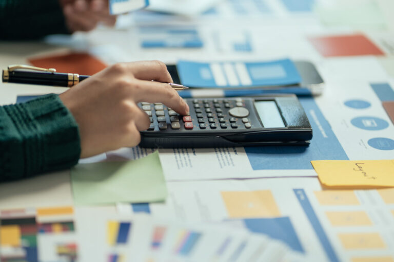 Employee Calculating Pension Contributions